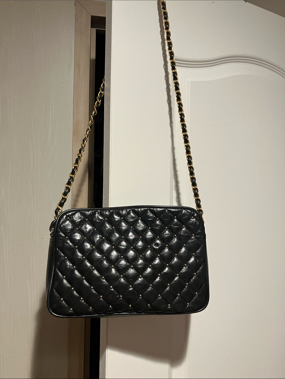 Black Quilted Leather Crossbody Bag with Gold Chain Strap